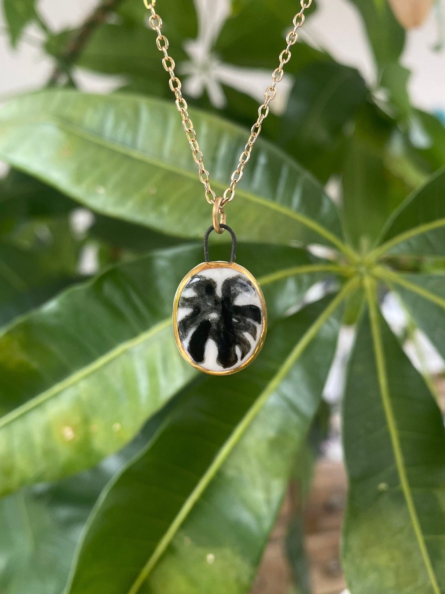 Hand-Sculpted Porcelain Monstera Pendant: 24k Gold Lustre Ceramic Necklace Charm