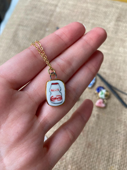 Hand-Sculpted Porcelain Yakult Pendant: 24k Gold Lustre Ceramic Necklace Charm
