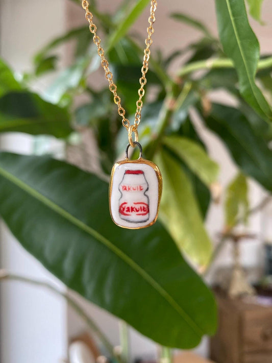 Hand-Sculpted Porcelain Yakult Pendant: 24k Gold Lustre Ceramic Necklace Charm