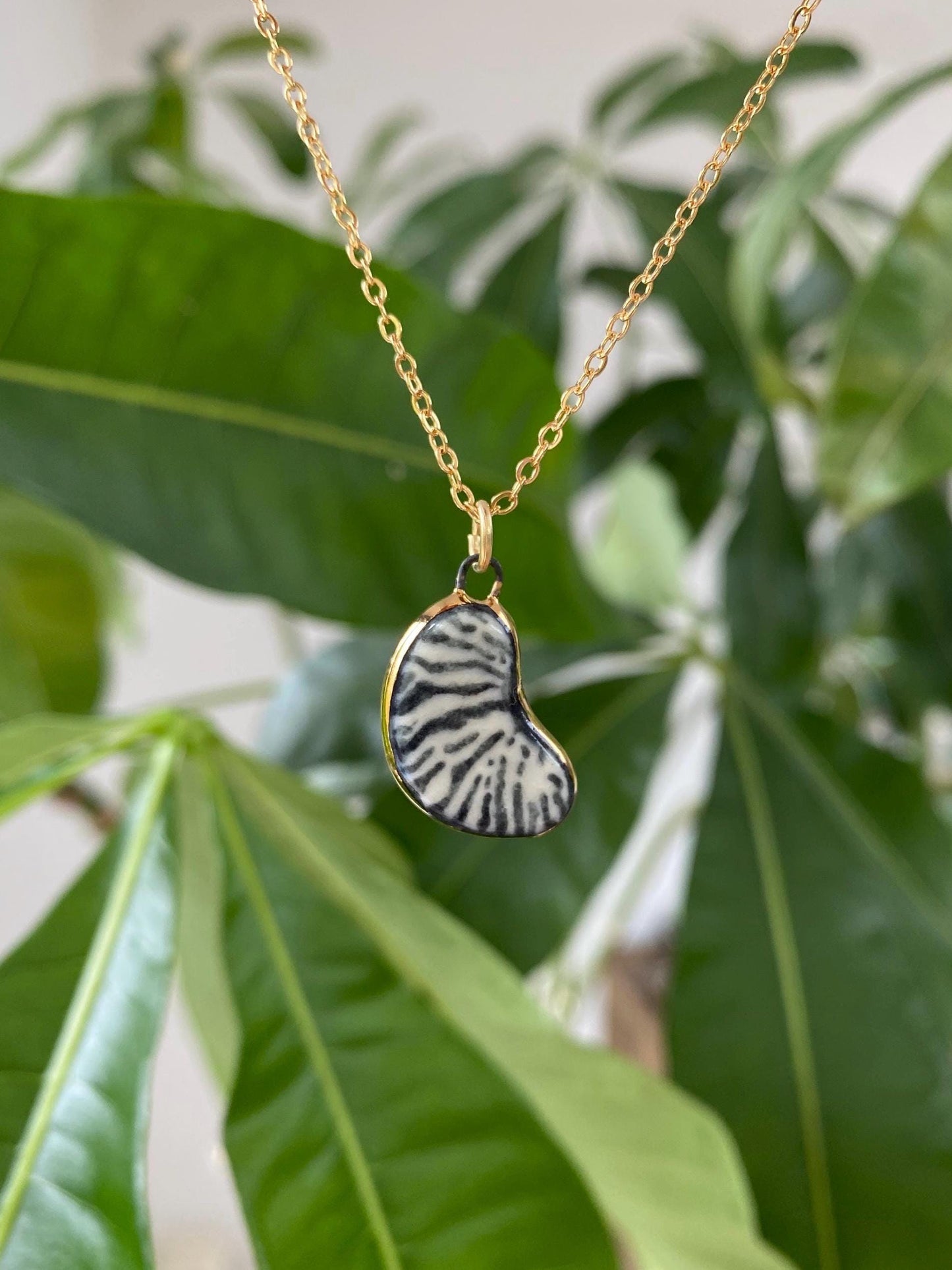 Hand-Sculpted Porcelain Bean Pendant: 24k Gold Lustre Ceramic Necklace Charm