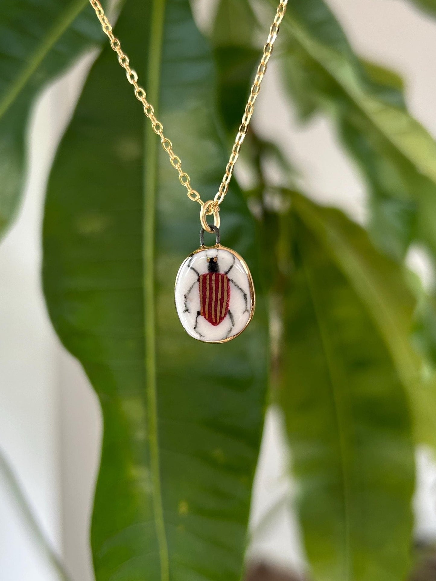 Hand-Sculpted Porcelain Beetle Pendant: 24k Gold Lustre Ceramic Necklace Charm
