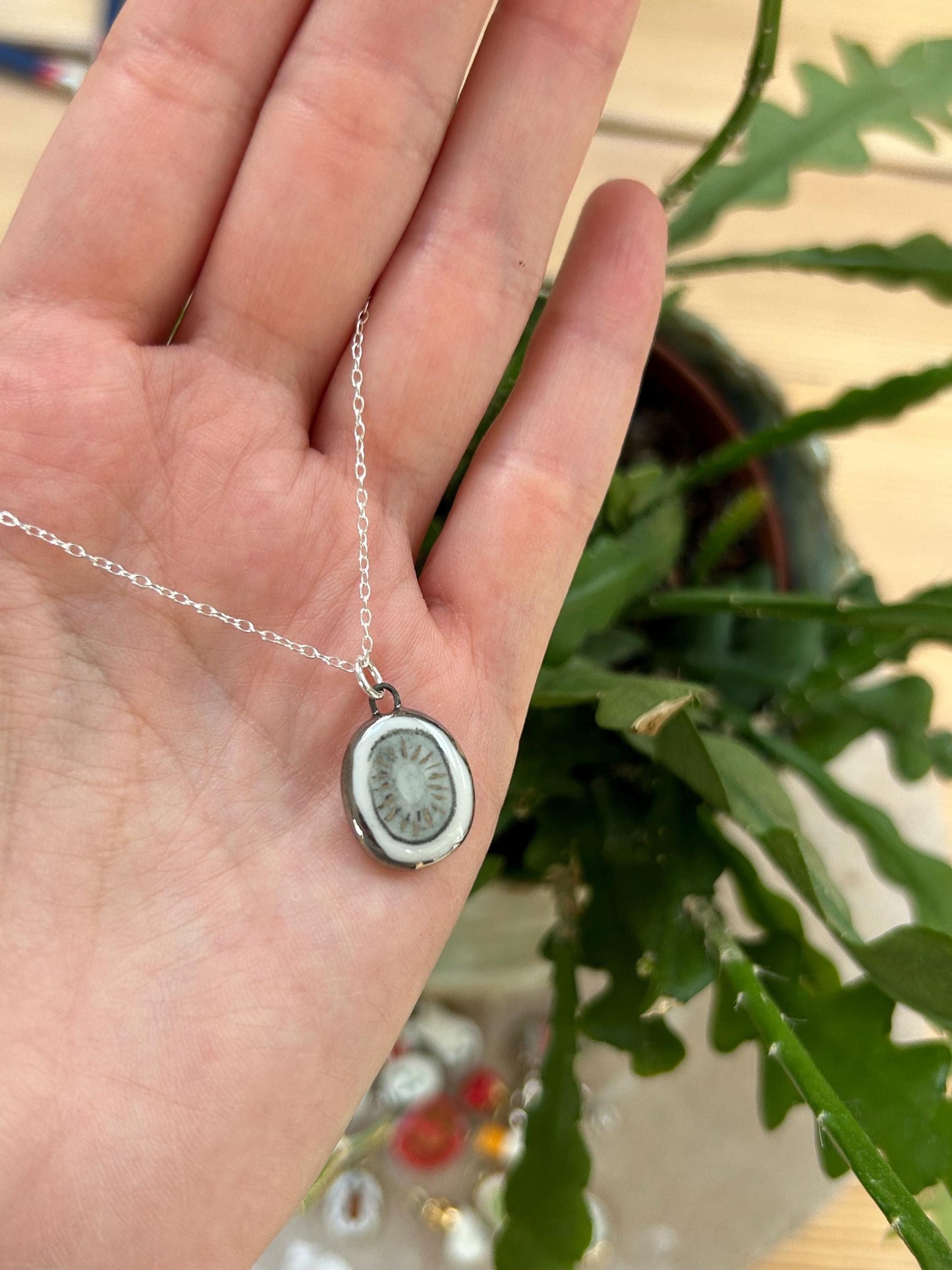 Hand-Sculpted Porcelain Kiwi Pendant: Platinum Lustre Ceramic Necklace Charm