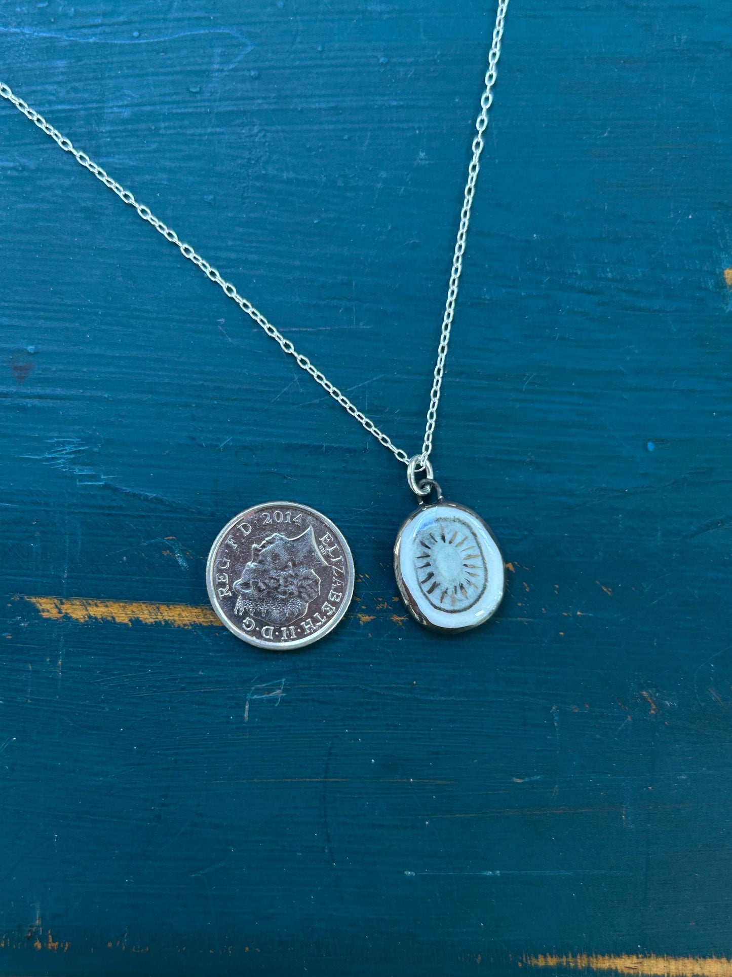 Hand-Sculpted Porcelain Kiwi Pendant: Platinum Lustre Ceramic Necklace Charm