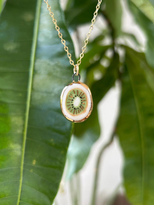 Hand-Sculpted Porcelain Kiwi Pendant: 24k Gold Lustre Ceramic Necklace Charm